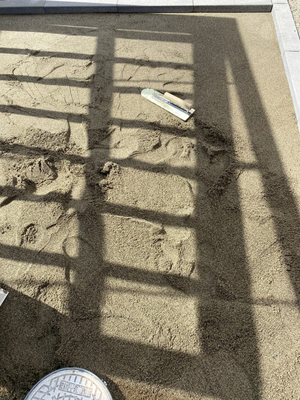 インターロッキング下地の砂敷き